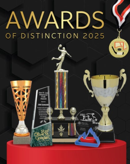 Collection of trophies and awards on a red surface with a dark background. 2025 catalogue for ordering
