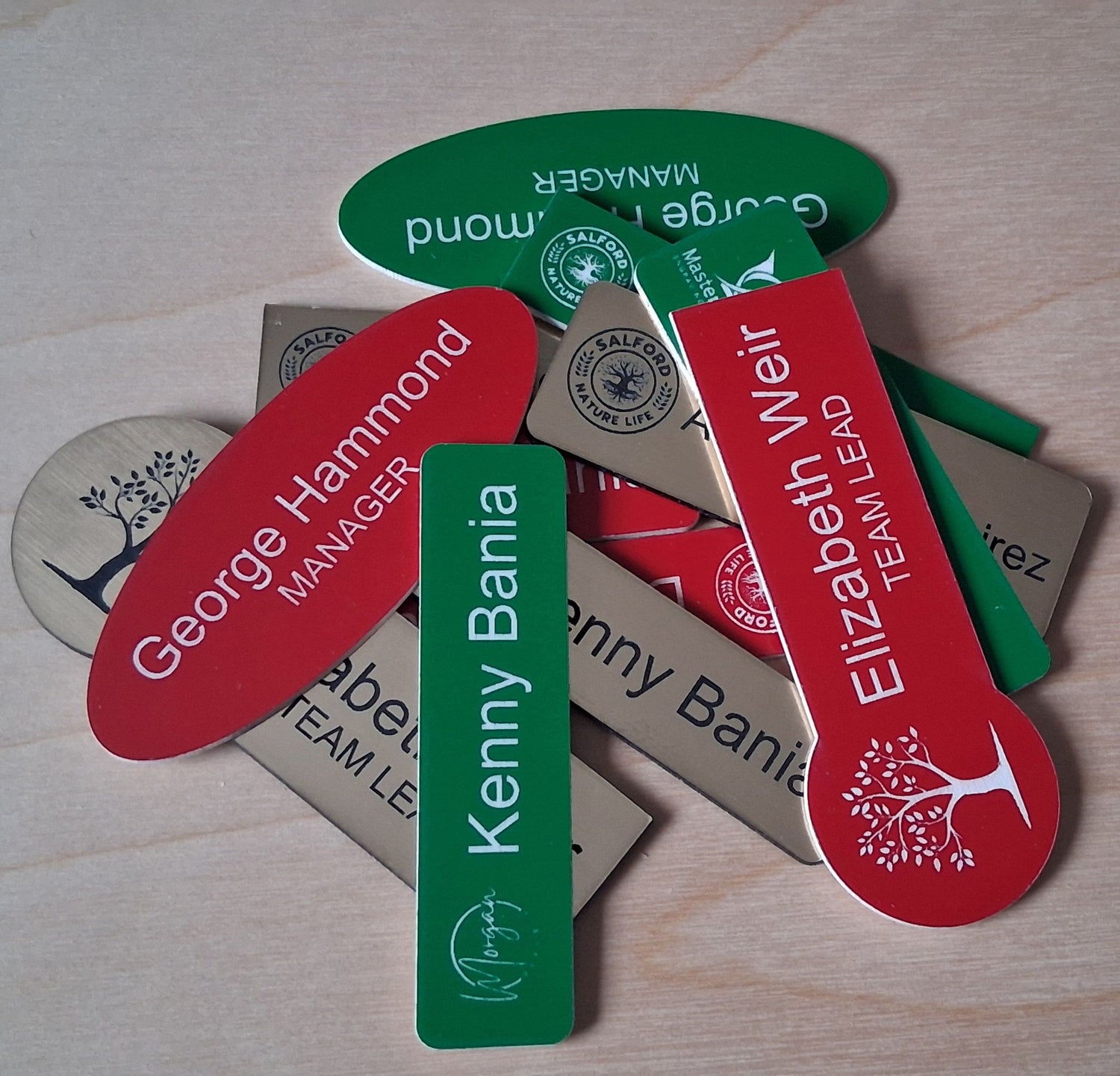 Custom engraved 2-ply plastic (lamacoid) name badges, name tags in various shapes