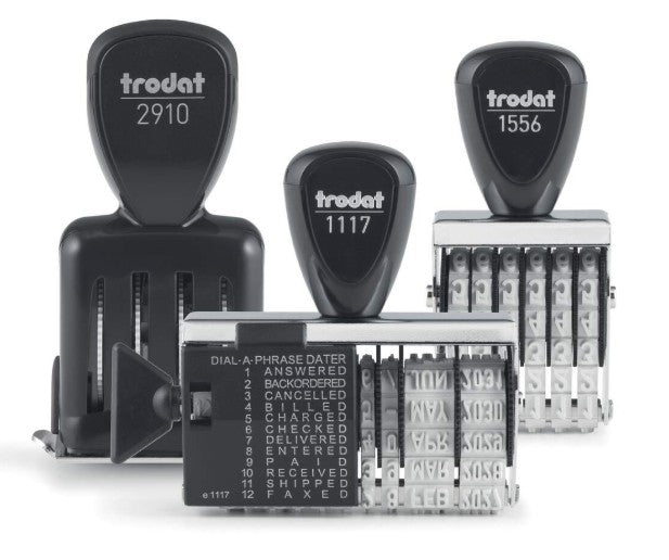 Custom produced set of Trodat date stamps on a white background